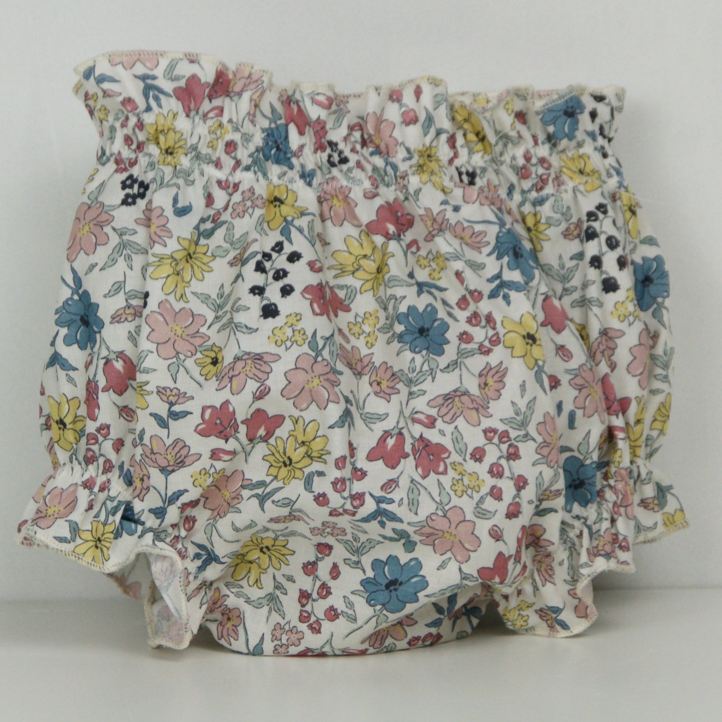 CUBRE PAÑAL FLORES