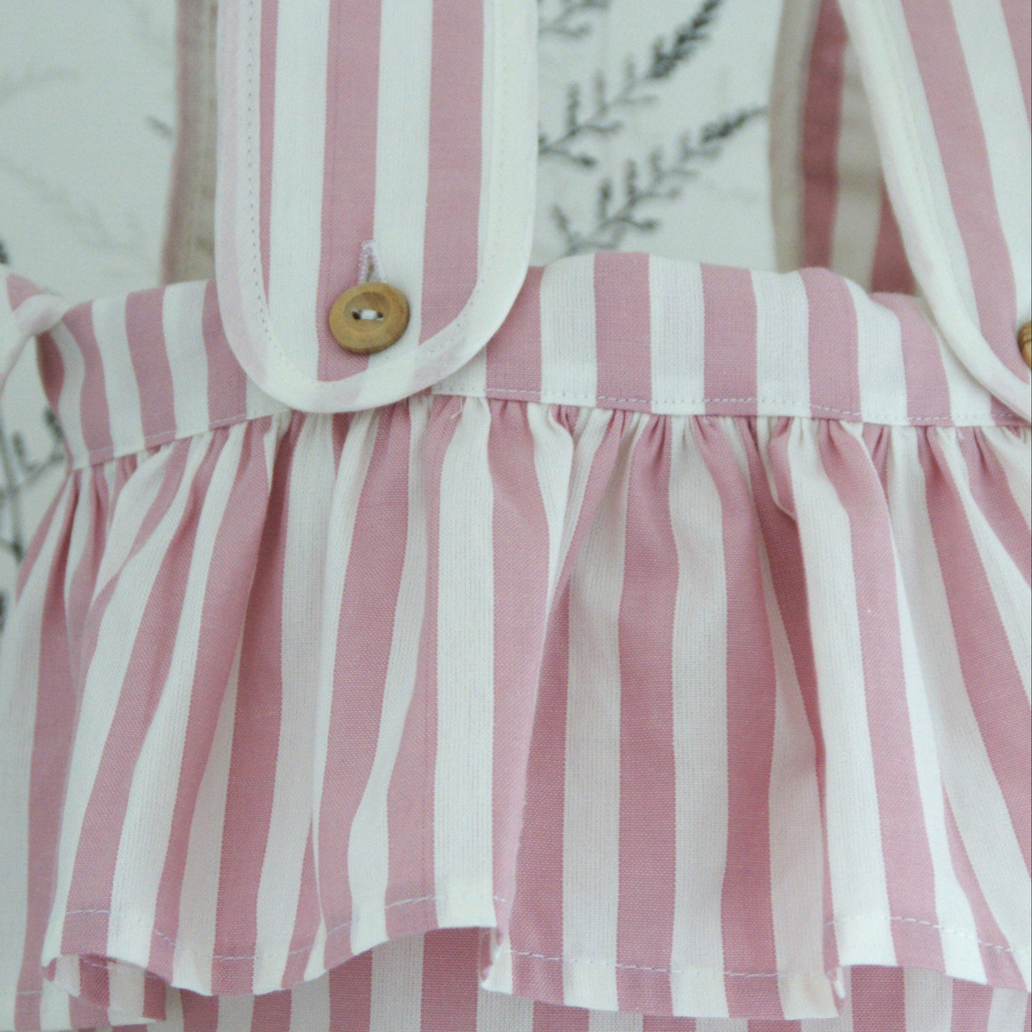 BOLSA CARRO REDONDA RAYAS ROSA